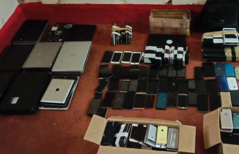 Laptops and mobile phones recovered by police in Kisii County.